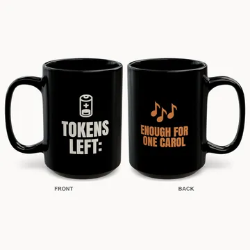 Black mug, front reads TOKENS LEFT: with a battery icon, back reads ENOUGH FOR ONE CAROL with music notes